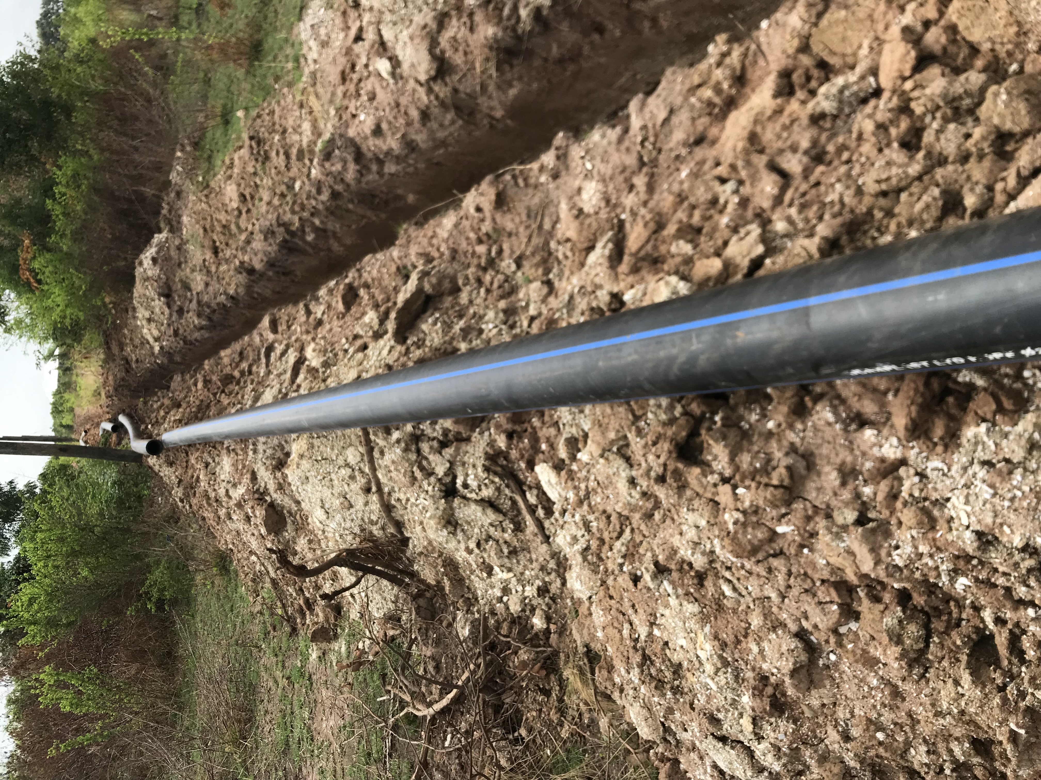Pipe laying activity at project site